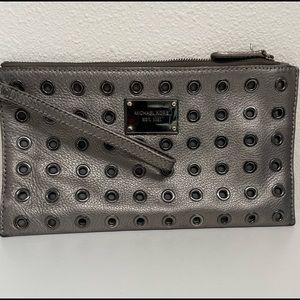 Michael Kors Grommet/Stud Clutch color Silver